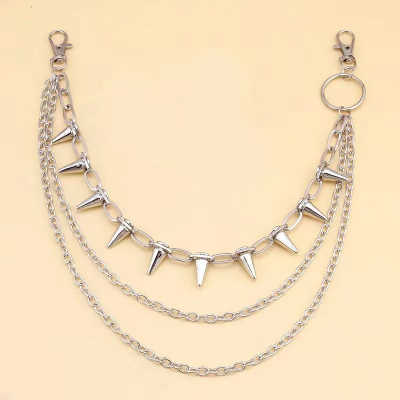 Layered punk spike and chain keychains for men and women, featuring edgy biker and goth style accessories.
