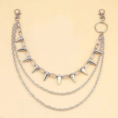 Layered punk spike and chain keychains for men and women, featuring edgy biker and goth style accessories.