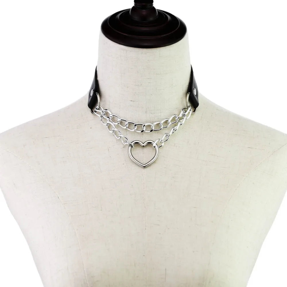 Black leather Gothic heart choker necklace with chain detail, perfect for punk and emo styles.