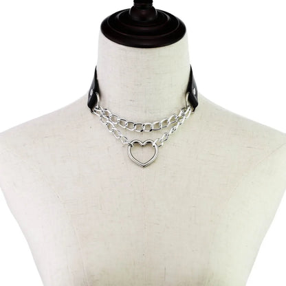 Black leather Gothic heart choker necklace with chain detail, perfect for punk and emo styles.