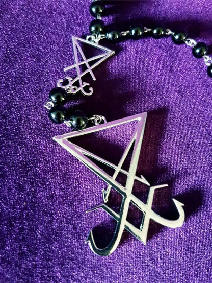 Luciferian Sigil Rosary Necklace, gothic occult jewelry featuring dark metal beads and sigil pendant for the Left Hand Path.