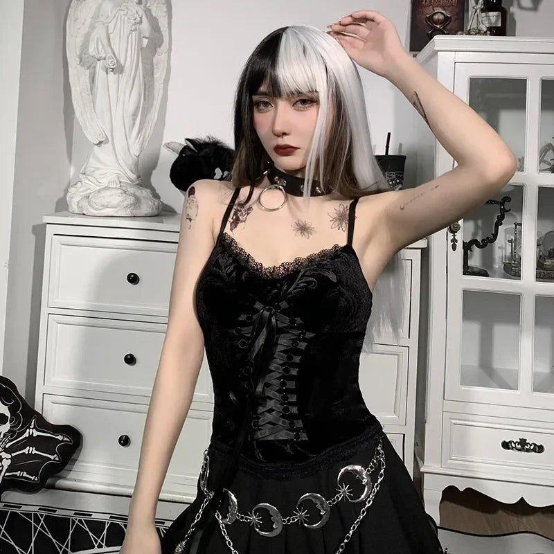 Black velvet Y2K goth crop top with lace trim, backless design, sleeveless straps, and emo-inspired aesthetic for women.