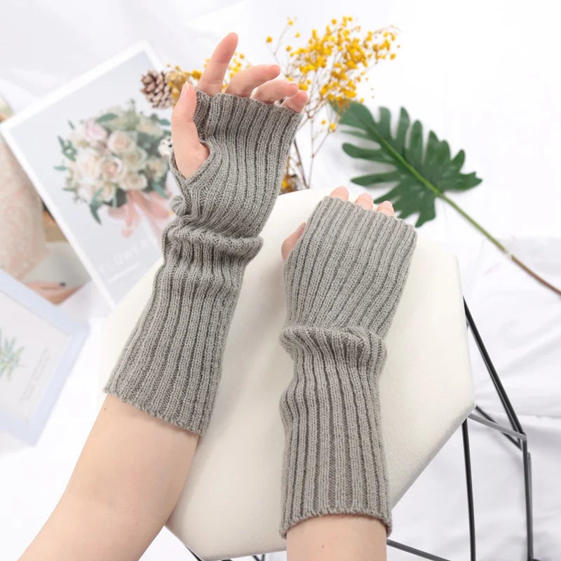 Chic women's long fingerless gloves by PressureDen.store, cozy winter arm sleeves with goth and punk style details.
