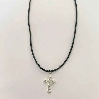 Rhinestone cross choker necklace by PressureDen.store featuring spiral hippie goth punk style jewelry for women.