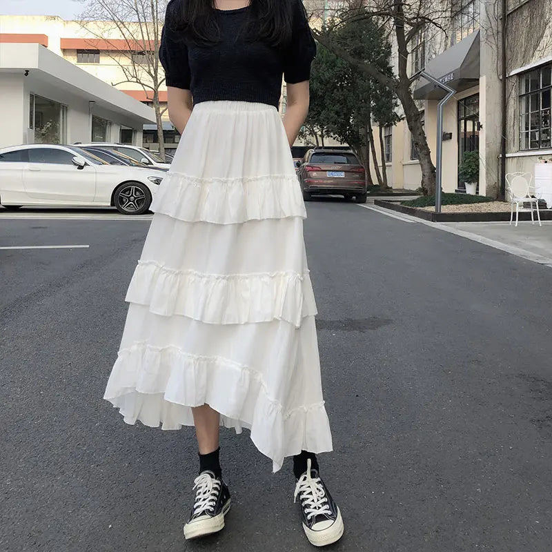 Gothic Lolita high-waisted asymmetrical midi long skirt with ruffles, perfect for summer, designed for women by PressureDen.store