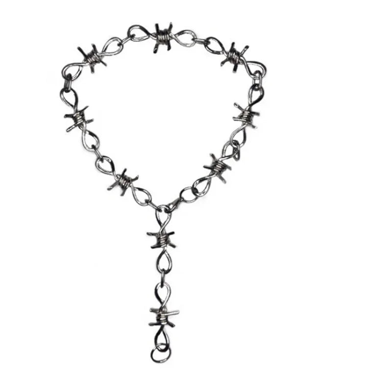 Vintage punk barbed wire choker necklace by PressureDen.store with edgy goth style and metal accents.