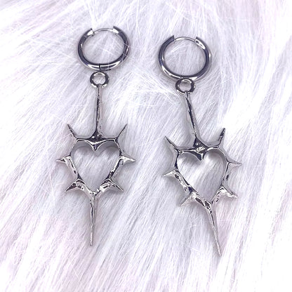 Gothic Thorn Heart Cross Earrings for women featuring punk grunge style, with dark metal design and intricate cross and heart details.