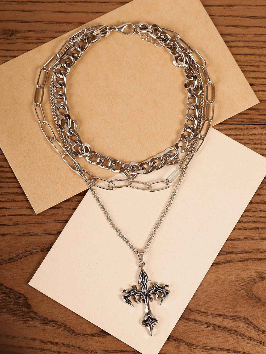 Sacina Gothic layered cross choker necklace featuring multiple crosses, perfect for emo, grunge, and Halloween fashion styles.