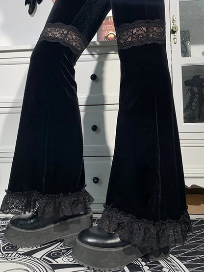 Dark black velvet punk flare pants with lace patchwork and hollow out details, featuring edgy Harajuku gothic style.