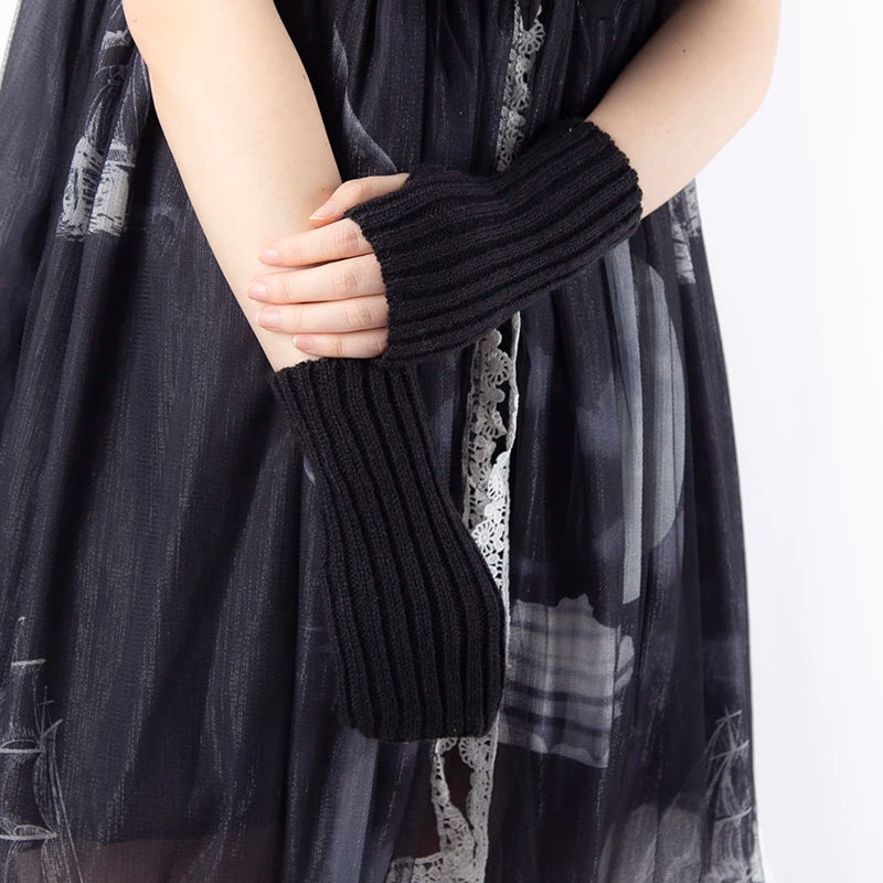 Kawaii crochet fingerless winter gloves for women, black goth lolita arm warmers, stylish and cozy accessory.