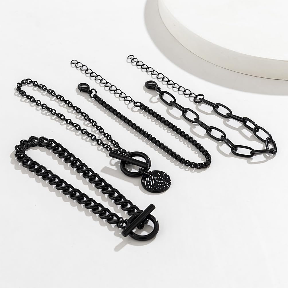 Stackable black bracelets set by SAVNOJW featuring gold coin accents and vintage chains, ideal for gothic, Y2K, or Halloween styles.