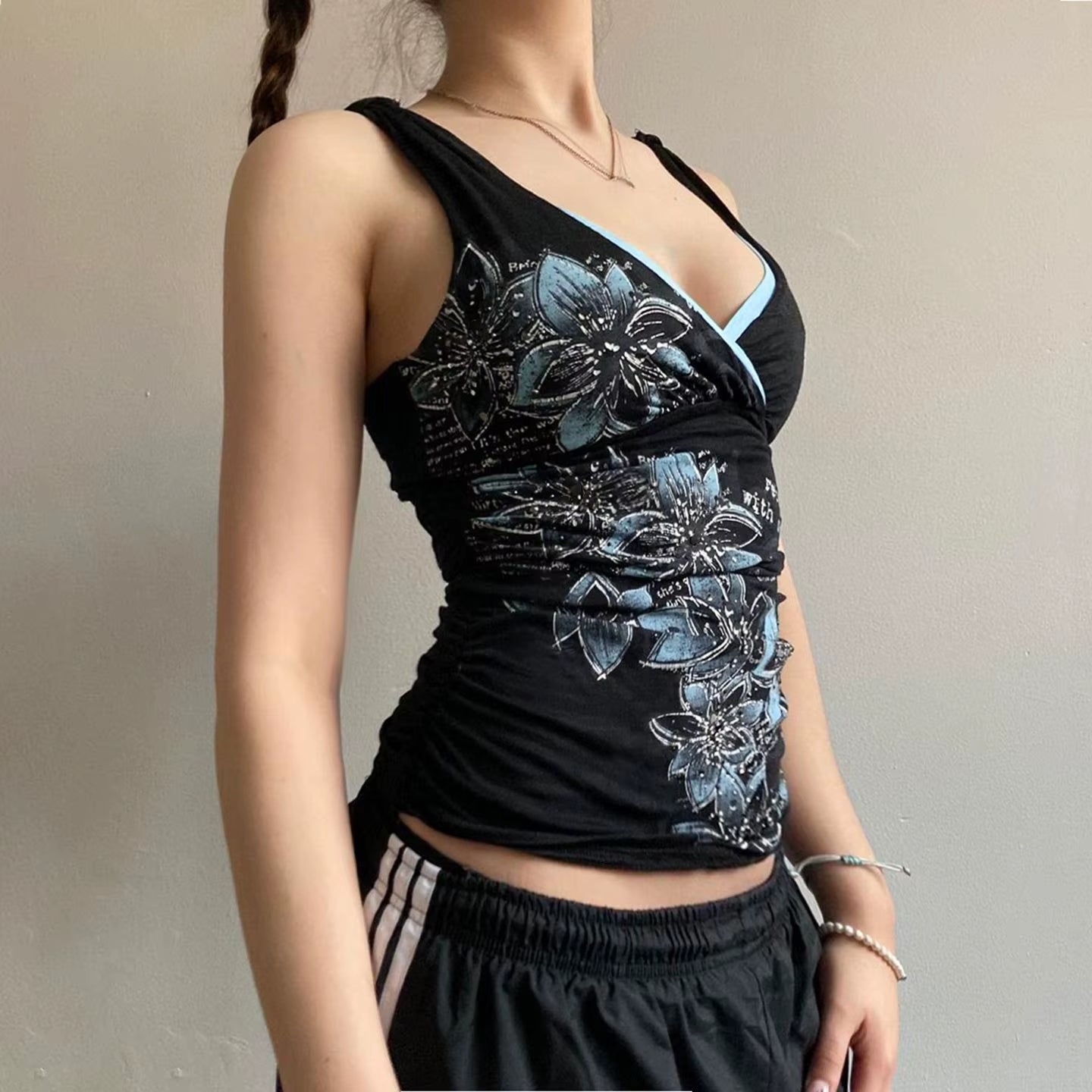 Black printed suspender vest for women, American retro Y2K goth style, slim V-neck top with stylish details by PressureDen.store.