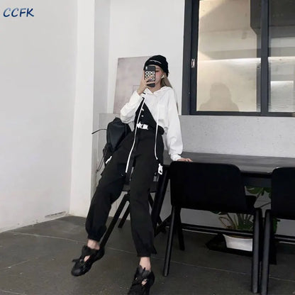 Gothic techwear cargo pants for women featuring high waist, Harajuku street style, with detachable shorts and modern black design.