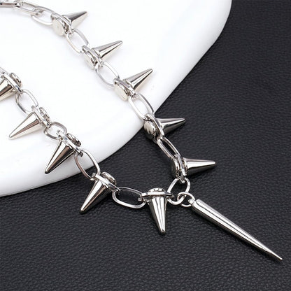 Silver spiked choker necklace by Egfyqzbryn featuring goth rivets and chains, ideal for parties and night club fashion.