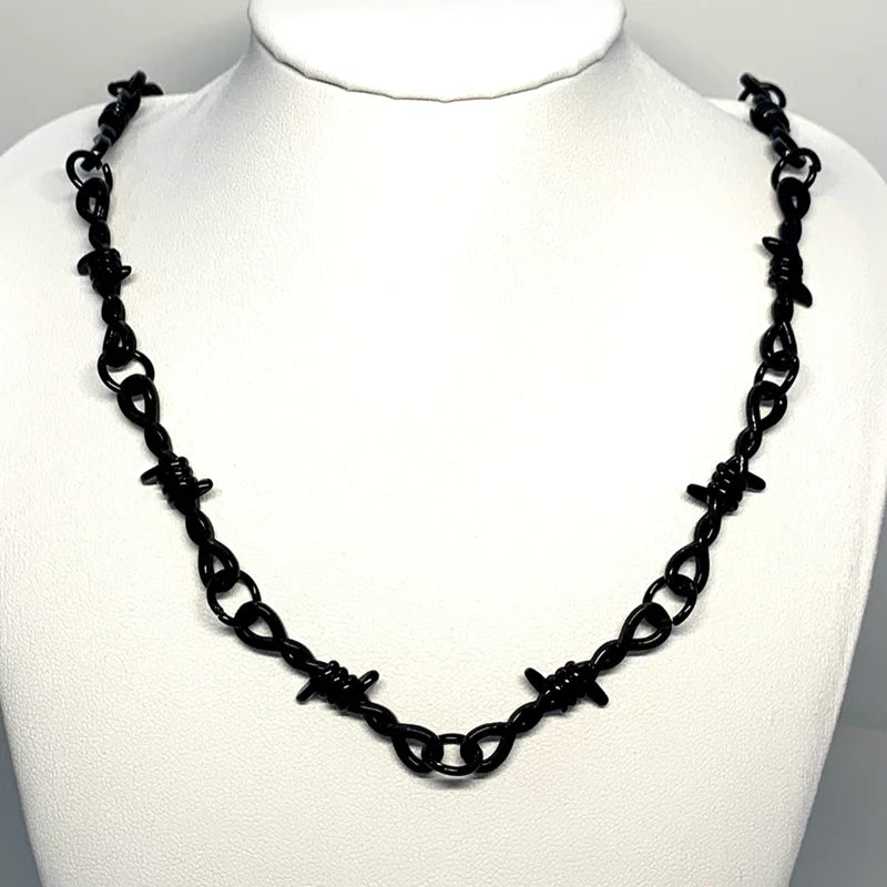Gothic heart choker necklace with barbed wire design, hip-hop inspired jewelry for women, featuring edgy, bold style.