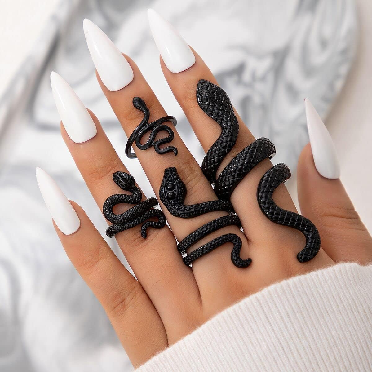 Adjustable black snake rings set by ONBRIG featuring vintage gothic punk style jewelry for women.