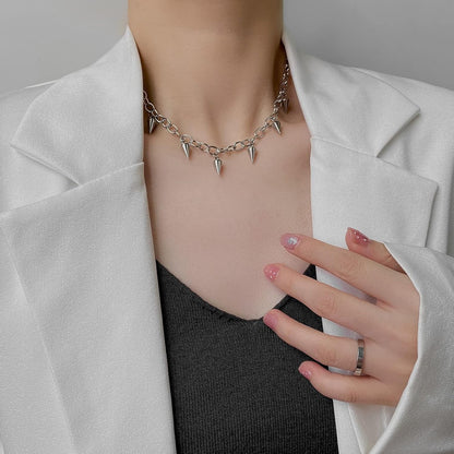 Tosmifairy punk rock spiked stainless steel choker necklace with 7-piece Y2K goth jewelry set, featuring edgy spikes and sleek design.
