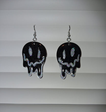 Yellow melting smiley face earrings with glittery dripping design, trendy Y2K jewelry, hypoallergenic statement accessory.